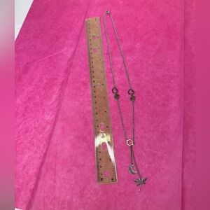 Silver necklace with gold and silver charms